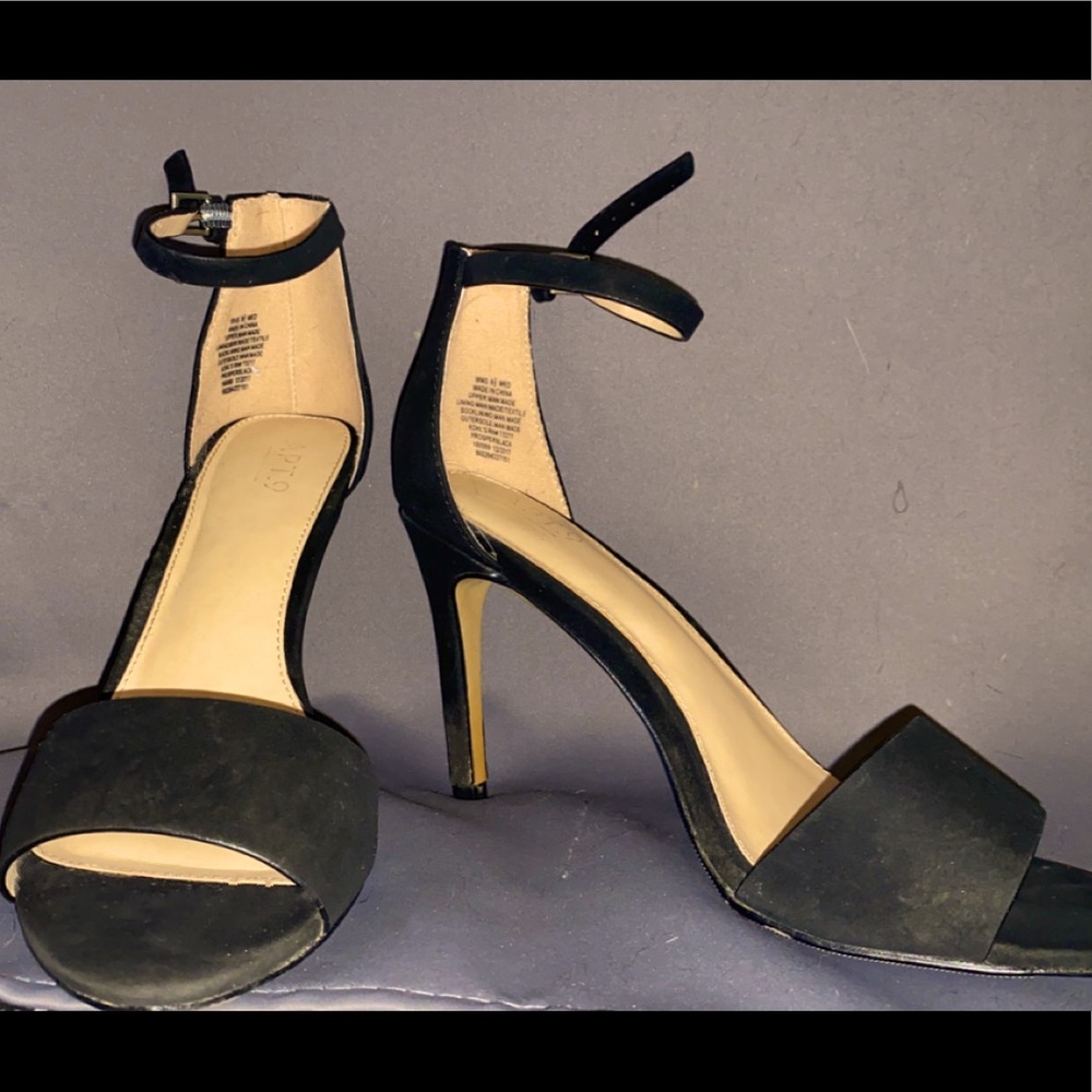 Black high heel. 4 inches.
